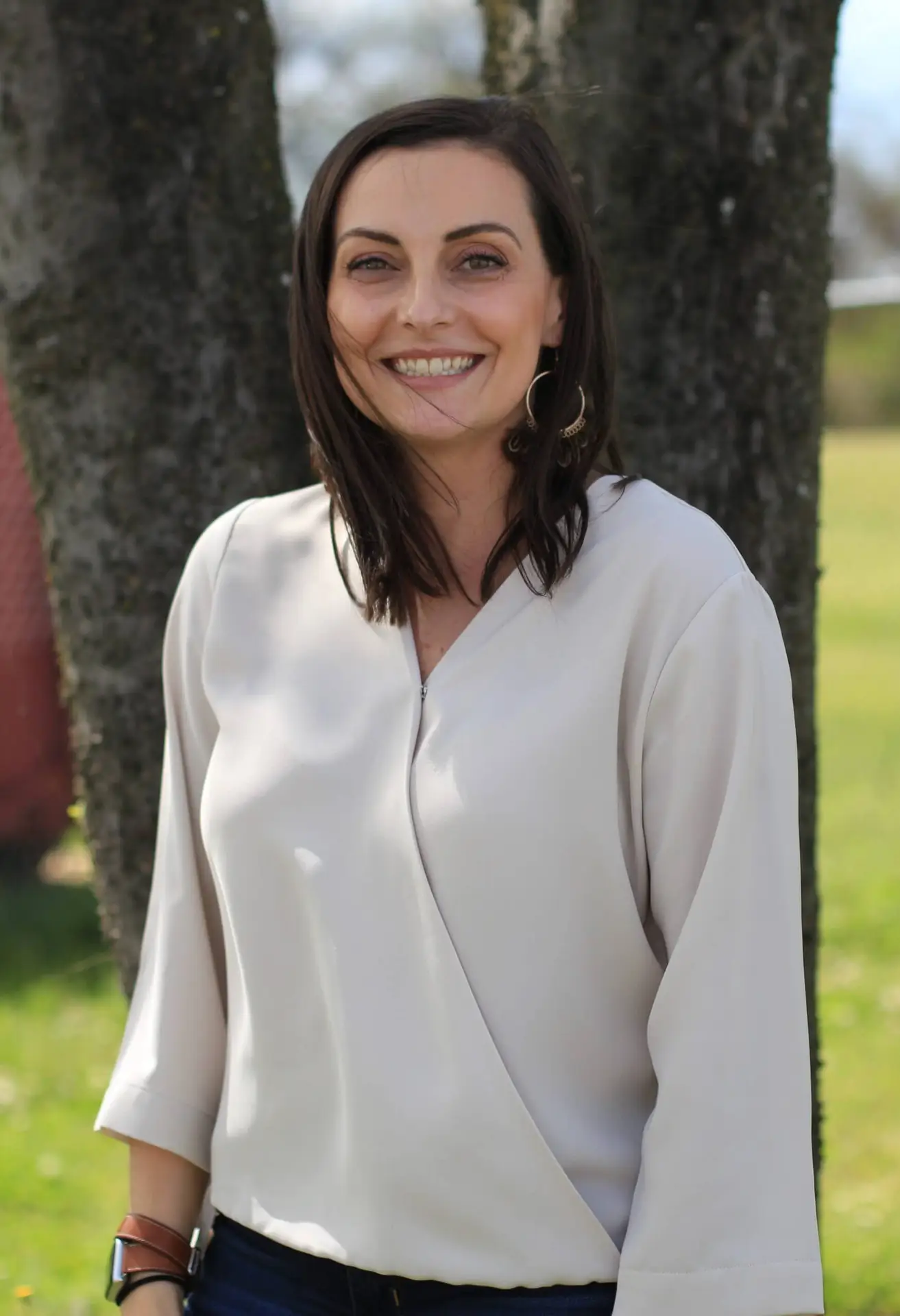 Nikki Weiss CFO of Weiss flooring smiling at the camera.