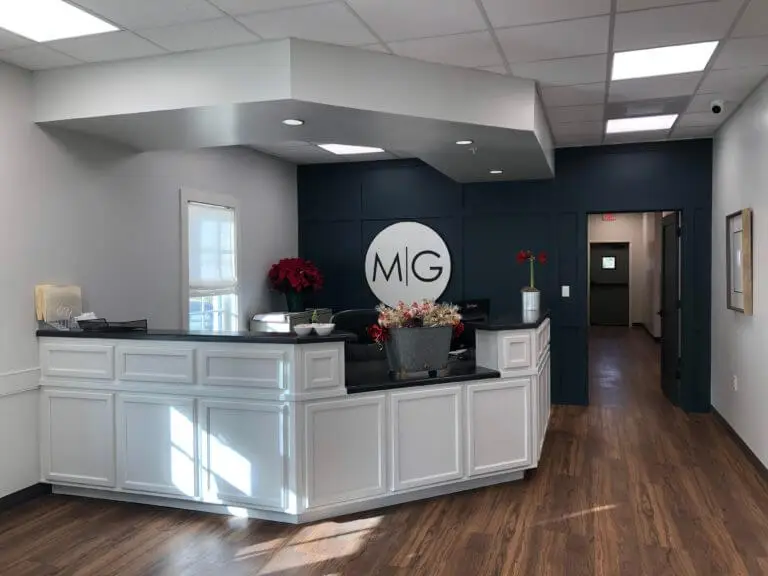 Modern reception area with flowers.