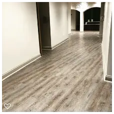 Shoal Creek Baptist Church Flooring Renovation 5 Light brown LVT flooring in the hallway at Shoal Creek Baptist Church