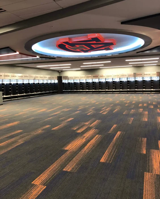 Modern locker room with orange accents